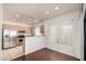 Bright, open concept with stainless appliances, wood floors and access to an outdoor patio at 295 N Rural Rd # 160, Chandler, AZ 85226