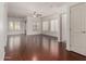 Bright living room featuring hardwood floors, recessed lighting, ceiling fan, and access to the exterior at 295 N Rural Rd # 160, Chandler, AZ 85226