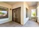 Covered patio with sliding glass door entry and views of the community at 295 N Rural Rd # 160, Chandler, AZ 85226