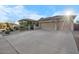 Charming single-story home featuring a three-car garage and low-maintenance desert landscaping at 32020 N 20Th Dr, Phoenix, AZ 85085