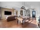 Spacious game room featuring a pool table, large windows, and stylish decor at 32020 N 20Th Dr, Phoenix, AZ 85085