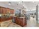 Open kitchen featuring granite countertops, stainless steel appliances, and a breakfast bar at 32020 N 20Th Dr, Phoenix, AZ 85085