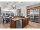 Spacious kitchen features a granite island, stainless steel appliances and tile flooring at 32020 N 20Th Dr, Phoenix, AZ 85085