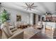Inviting living room features hardwood floors, comfortable seating, and natural light at 32020 N 20Th Dr, Phoenix, AZ 85085