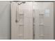 Clean bathroom featuring a glass-enclosed shower with modern fixtures and tile details at 32729 N Mach Ln, San Tan Valley, AZ 85143