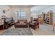 Cozy living room featuring comfortable seating, natural light, and access to the dining area at 32729 N Mach Ln, San Tan Valley, AZ 85143