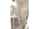 Cozy bathroom with a pedestal sink, tile accents, and neutral decor at 3581 S Arizona Pl, Chandler, AZ 85286