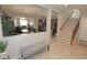 Spacious entryway with tile flooring, offering views of the living room, kitchen, and staircase at 3581 S Arizona Pl, Chandler, AZ 85286