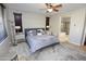 Spacious main bedroom with hardwood floors, neutral colors, and soft lighting at 3581 S Arizona Pl, Chandler, AZ 85286