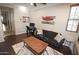 Office features a pull out couch, ceiling fan, and natural light from a window at 3581 S Arizona Pl, Chandler, AZ 85286
