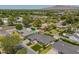 An aerial view featuring lush landscaping, a manicured lawn and neighborhood at 4010 E Coolidge St, Phoenix, AZ 85018