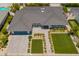 Aerial view showcasing the property with a well-maintained yard and manicured landscaping at 4010 E Coolidge St, Phoenix, AZ 85018