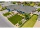 An aerial view of the property showcasing its landscaped front yard and roof at 4010 E Coolidge St, Phoenix, AZ 85018