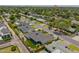 Lovely neighborhood featuring mature landscaping, single-story homes, and street lined with mature shade trees at 4010 E Coolidge St, Phoenix, AZ 85018