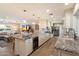 Bright, open kitchen boasts granite countertops, stainless steel appliances, and modern lighting at 4010 E Coolidge St, Phoenix, AZ 85018