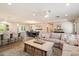 Spacious living area featuring an open layout with a view of the dining space and kitchen, ideal for gatherings at 4010 E Coolidge St, Phoenix, AZ 85018