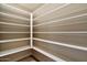 Walk-in pantry with ample shelving for organized storage at 4010 E Coolidge St, Phoenix, AZ 85018
