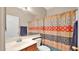 Bathroom with a decorative shower curtain and ample counter space at 4167 E Hallihan Dr, Cave Creek, AZ 85331