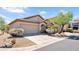 Beautiful single-story home with a two car garage and well-manicured desert landscaping at 4167 E Hallihan Dr, Cave Creek, AZ 85331