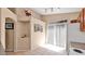 Kitchen space with wall art and sliding glass doors with white blinds at 4167 E Hallihan Dr, Cave Creek, AZ 85331