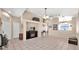 Open-concept living room featuring a fireplace and tile flooring at 4167 E Hallihan Dr, Cave Creek, AZ 85331