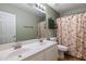This bathroom features a double sink vanity and a shower at 4223 E Danbury Rd, Phoenix, AZ 85032