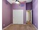 This bedroom offers a spacious closet with a ceiling fan at 4223 E Danbury Rd, Phoenix, AZ 85032
