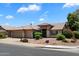 Charming single-story home with well-maintained landscaping and a tiled roof at 4223 E Danbury Rd, Phoenix, AZ 85032