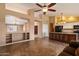 Open-concept living space combining the kitchen, living, and dining areas at 4223 E Danbury Rd, Phoenix, AZ 85032