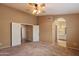 Spacious primary bedroom showcasing carpet flooring at 4223 E Danbury Rd, Phoenix, AZ 85032