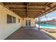 Covered back patio with a view of the pool and yard at 4238 W Krall St, Phoenix, AZ 85019