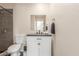 Updated bathroom with a new vanity, modern fixtures, and tiled shower at 4238 W Krall St, Phoenix, AZ 85019