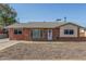 Quaint brick home with a well-maintained yard, neutral exterior and inviting front entrance at 4238 W Krall St, Phoenix, AZ 85019