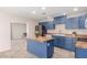The newly renovated kitchen is equipped with butcher block countertops and a full suite of stainless steel appliances at 4238 W Krall St, Phoenix, AZ 85019