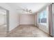 Bright living room featuring neutral walls and tile floors at 4238 W Krall St, Phoenix, AZ 85019