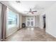 Bright living room with lots of natural light, tile floors and easy access to the kitchen at 4238 W Krall St, Phoenix, AZ 85019