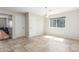 Bright living room featuring neutral walls and tile floors at 4238 W Krall St, Phoenix, AZ 85019