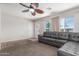 Comfortable living room featuring neutral walls and plush carpet at 4238 W Krall St, Phoenix, AZ 85019