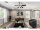 A cozy living room featuring a plush sofa, modern coffee table, and stylish decor at 4277 N 180Th Ln, Goodyear, AZ 85395