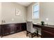 Office space with built-in shelves, desk, and a window at 4277 N 180Th Ln, Goodyear, AZ 85395