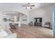 Large living area features high ceilings, hardwood floors, and seamless connection to the kitchen at 44853 W Jack Rabbit Trl, Maricopa, AZ 85139