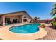 Inviting backyard pool with water feature, perfect for relaxation and outdoor enjoyment at 44853 W Jack Rabbit Trl, Maricopa, AZ 85139