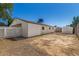 The backyard features privacy wall, landscaping, shed and a covered patio at 4526 W Mission Ln, Glendale, AZ 85302