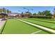 Well-maintained bocce ball courts with shade structures, perfect for outdoor recreation and socializing at 4528 E Donato Dr, Gilbert, AZ 85298