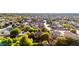 Aerial view of a neighborhood featuring tree-lined streets and beautifully landscaped homes at 5139 S Marble St, Gilbert, AZ 85298