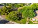 Overhead view of a home with mature trees and landscaping in a well-maintained residential area at 5139 S Marble St, Gilbert, AZ 85298