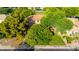 Aerial view of a home nestled among mature trees in a quiet, residential neighborhood at 5139 S Marble St, Gilbert, AZ 85298