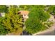 Aerial view of a home surrounded by mature trees in a lush, green neighborhood at 5139 S Marble St, Gilbert, AZ 85298