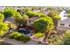 Aerial view highlighting the backyard, featuring a pool, lush landscaping, and private setting at 5139 S Marble St, Gilbert, AZ 85298