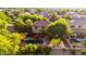 Aerial view of a home showcasing its backyard pool, lush landscaping, and outdoor living area at 5139 S Marble St, Gilbert, AZ 85298
